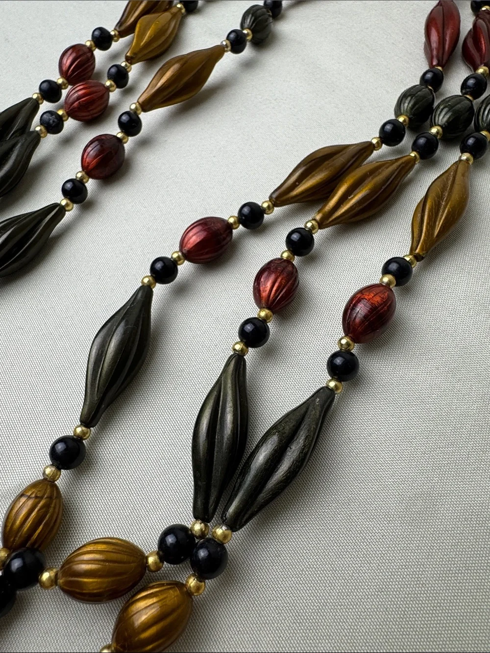 Multi-Strand Metallic Bead Necklace in Red, Gold & Black - Picture 4 of 10